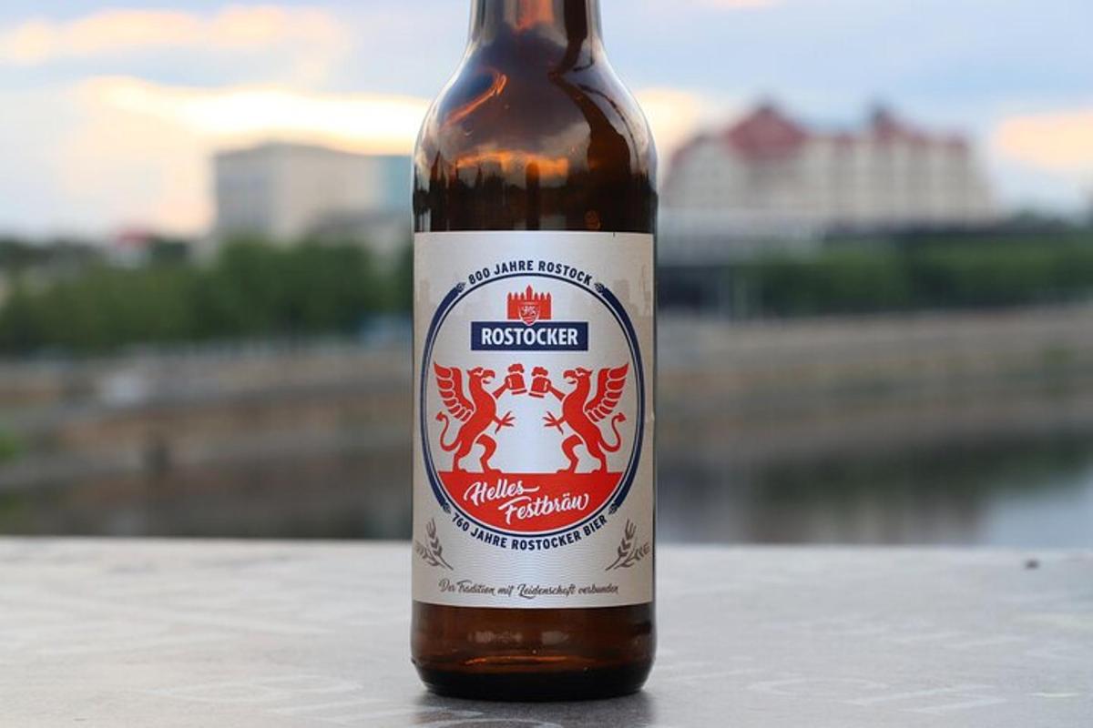 a bottle of beer sitting on a table