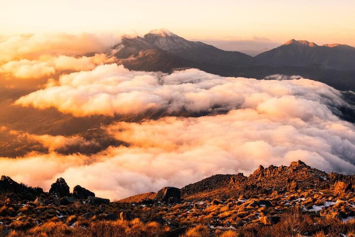 a view of a bunch of clouds in the mountains
