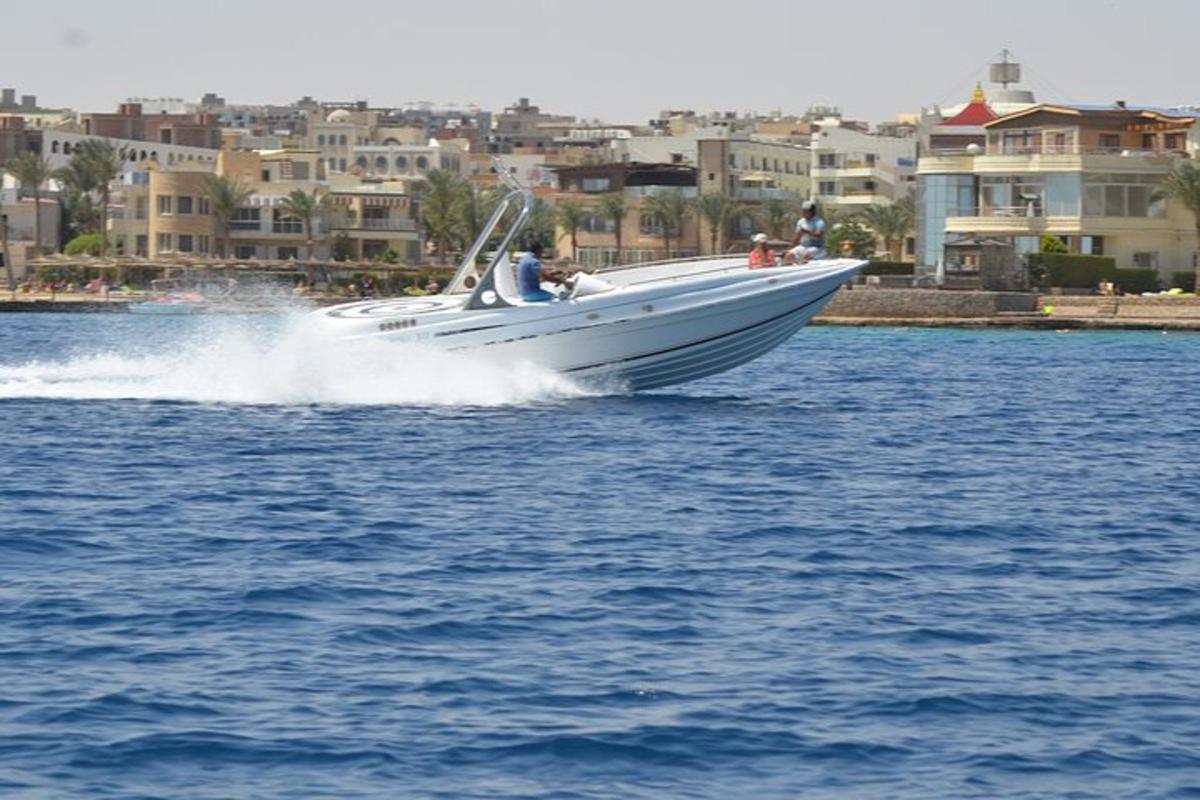 a white boat on a body of water