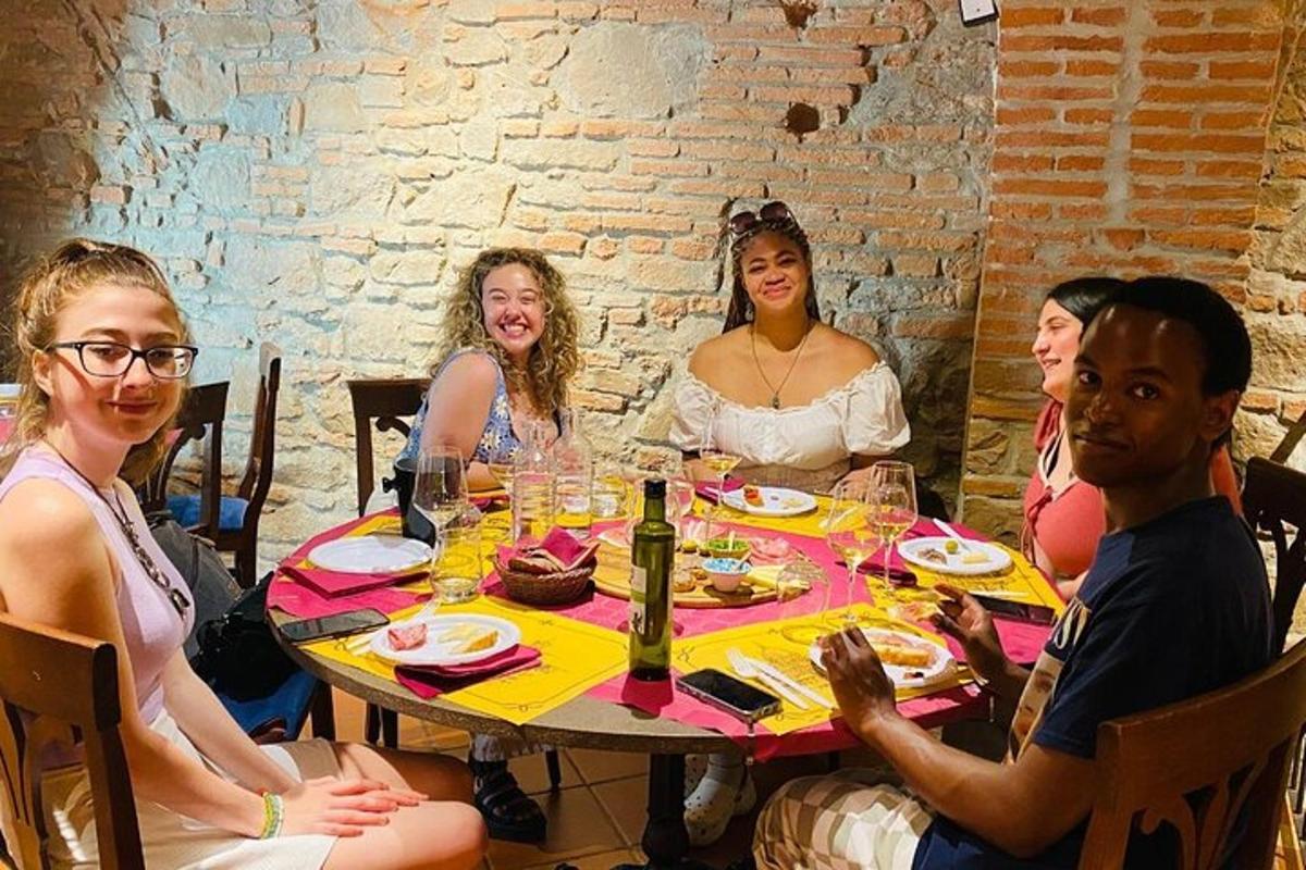 a group of people sitting around a table