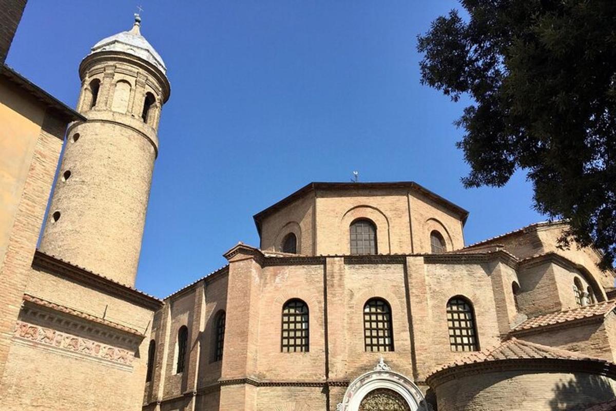 a building with a clock tower and a church