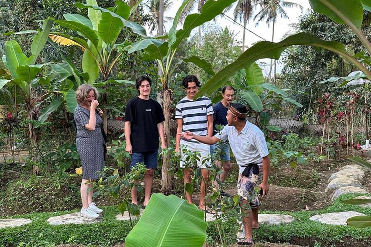 a group of people standing in a garden