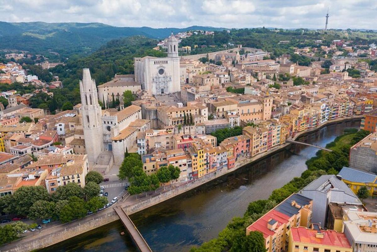 an aerial view of a city with a river
