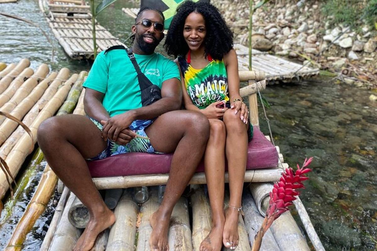 a man and a woman sitting on a raft in the water
