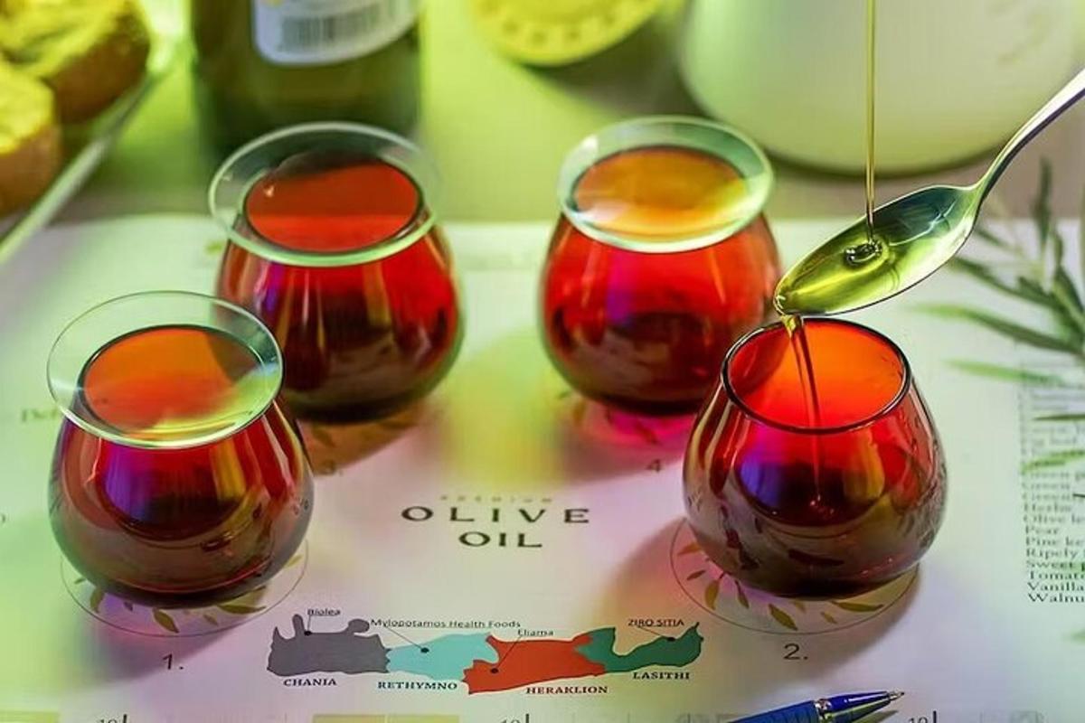 tre bicchieri di olio d'oliva appoggiati su una mappa