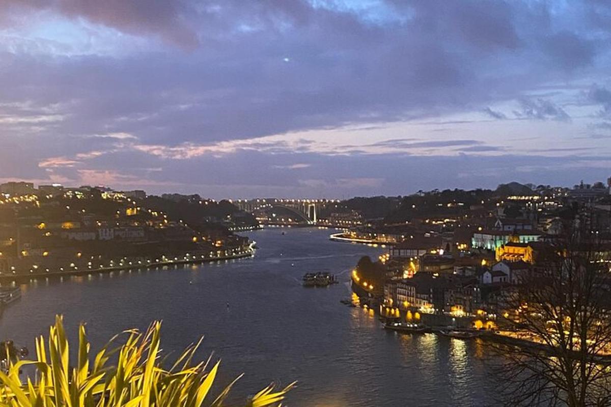 a view of a river with a city at night