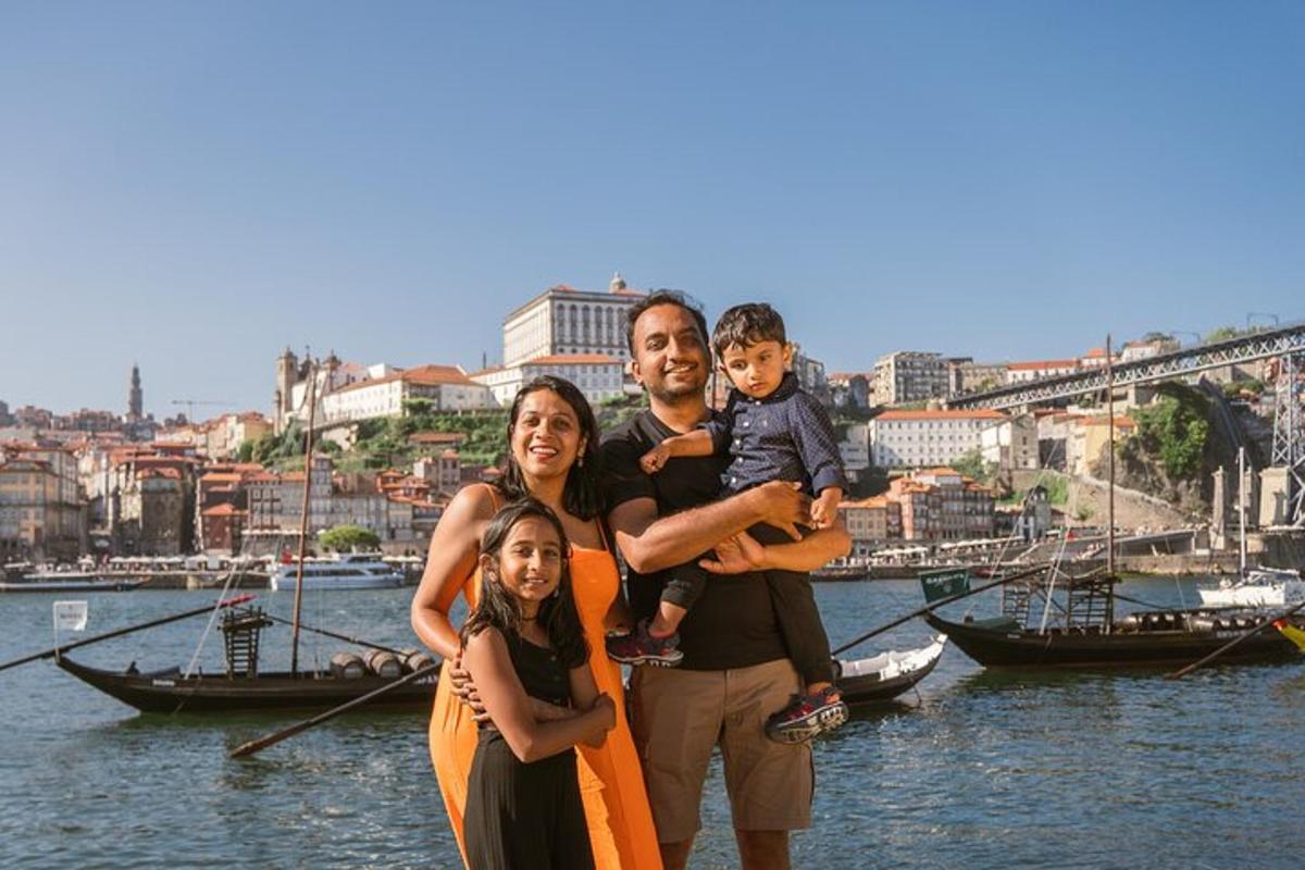 a family is standing in front of the water