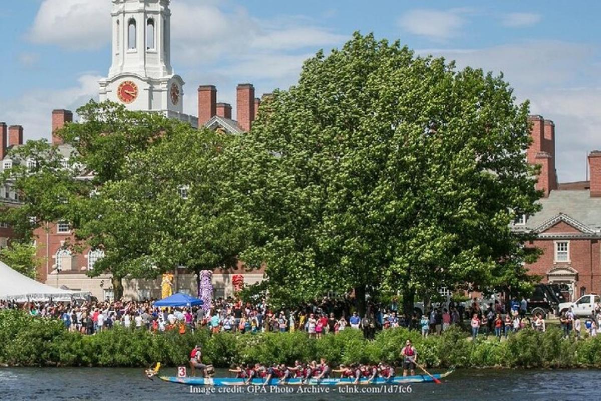 a group of people in a boat in the water