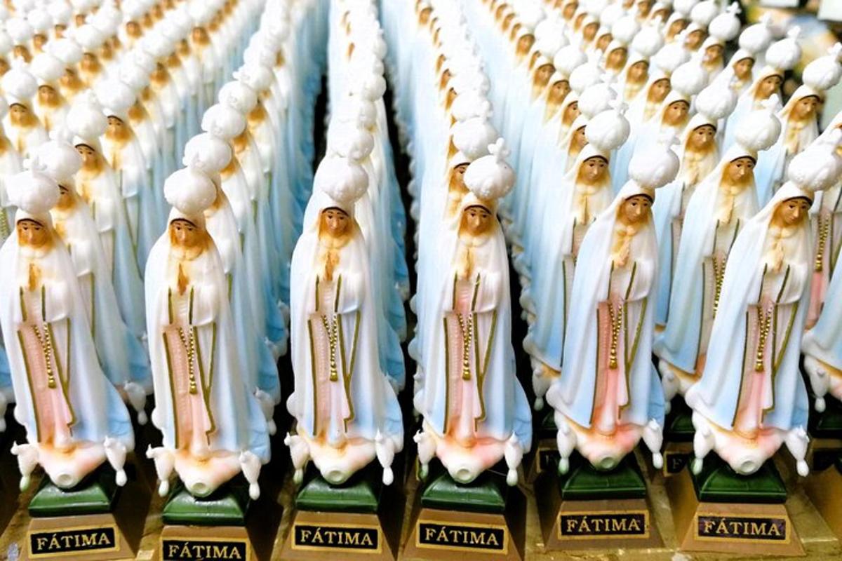 a row of figurines lined up in a row