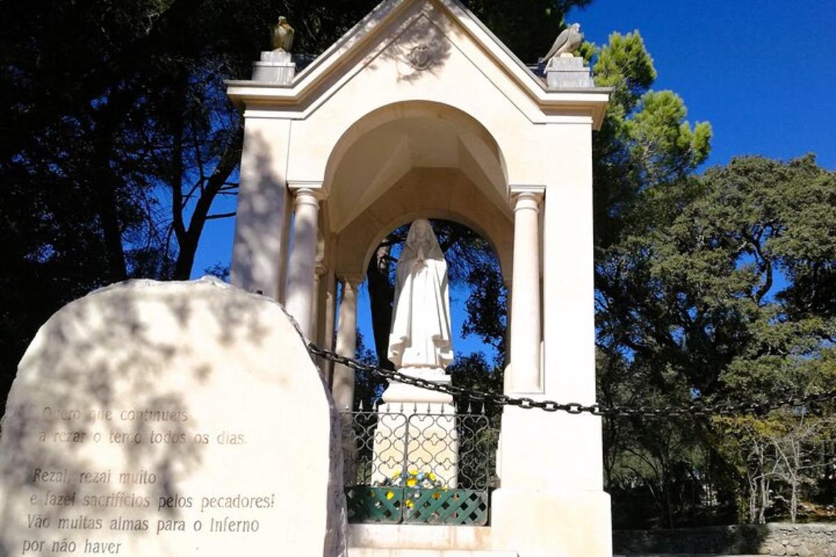 a statue of a woman in a tower