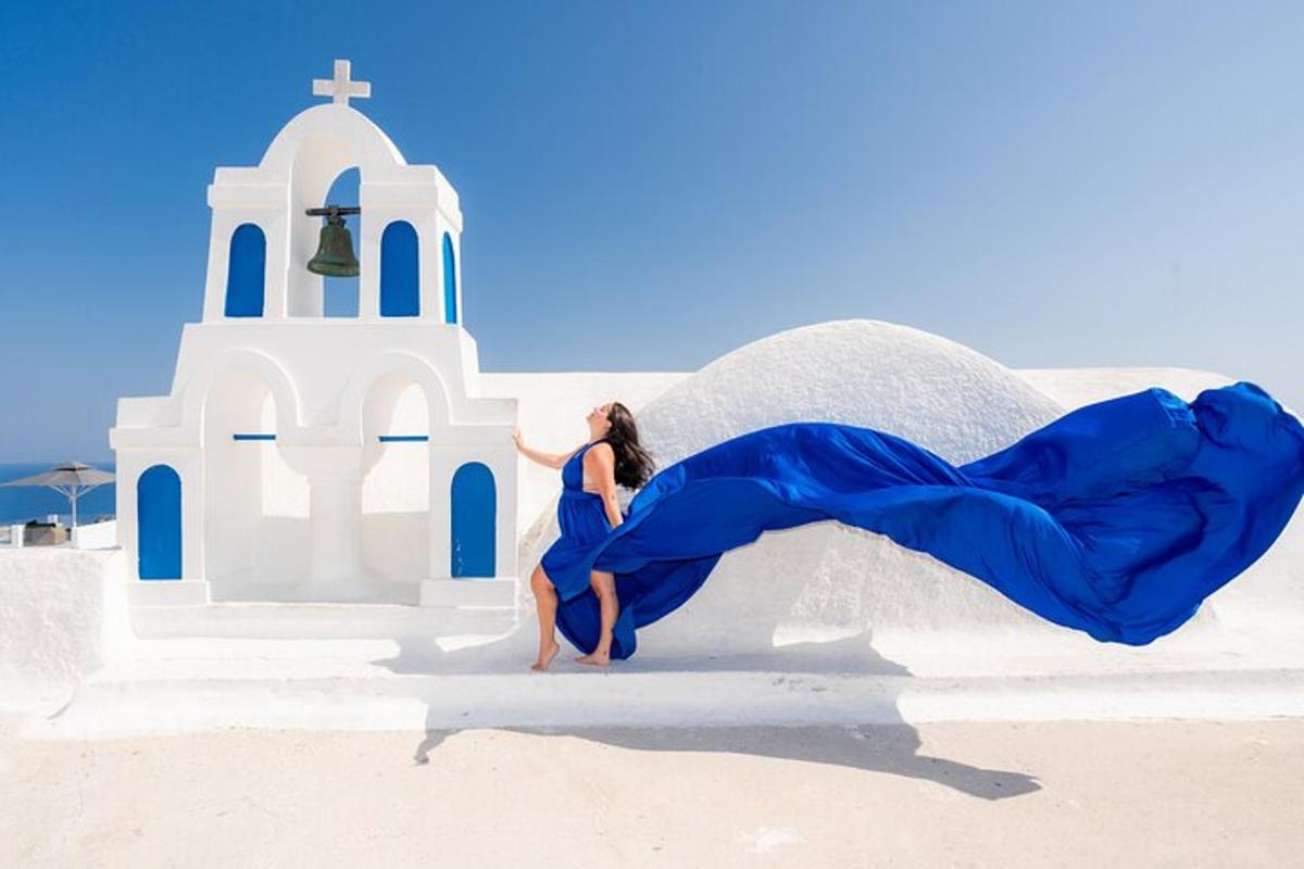 a woman in a blue dress poses in front of a church
