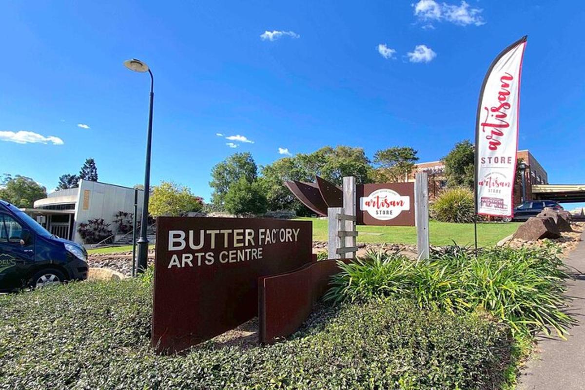 a sign for a building that says butteriftyifty arts centre