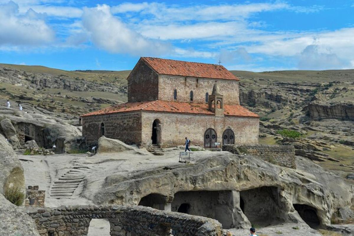 an old church sitting on top of a mountain