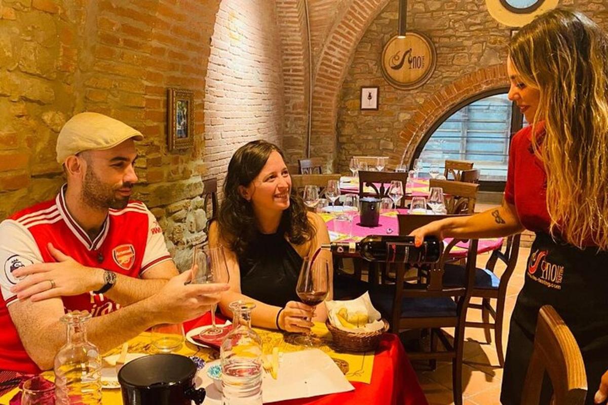 a group of people sitting at a table in a restaurant