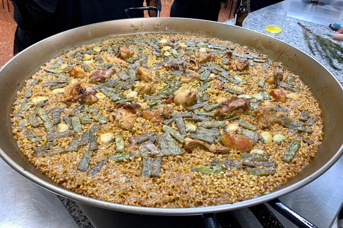a large pan of food on a stove