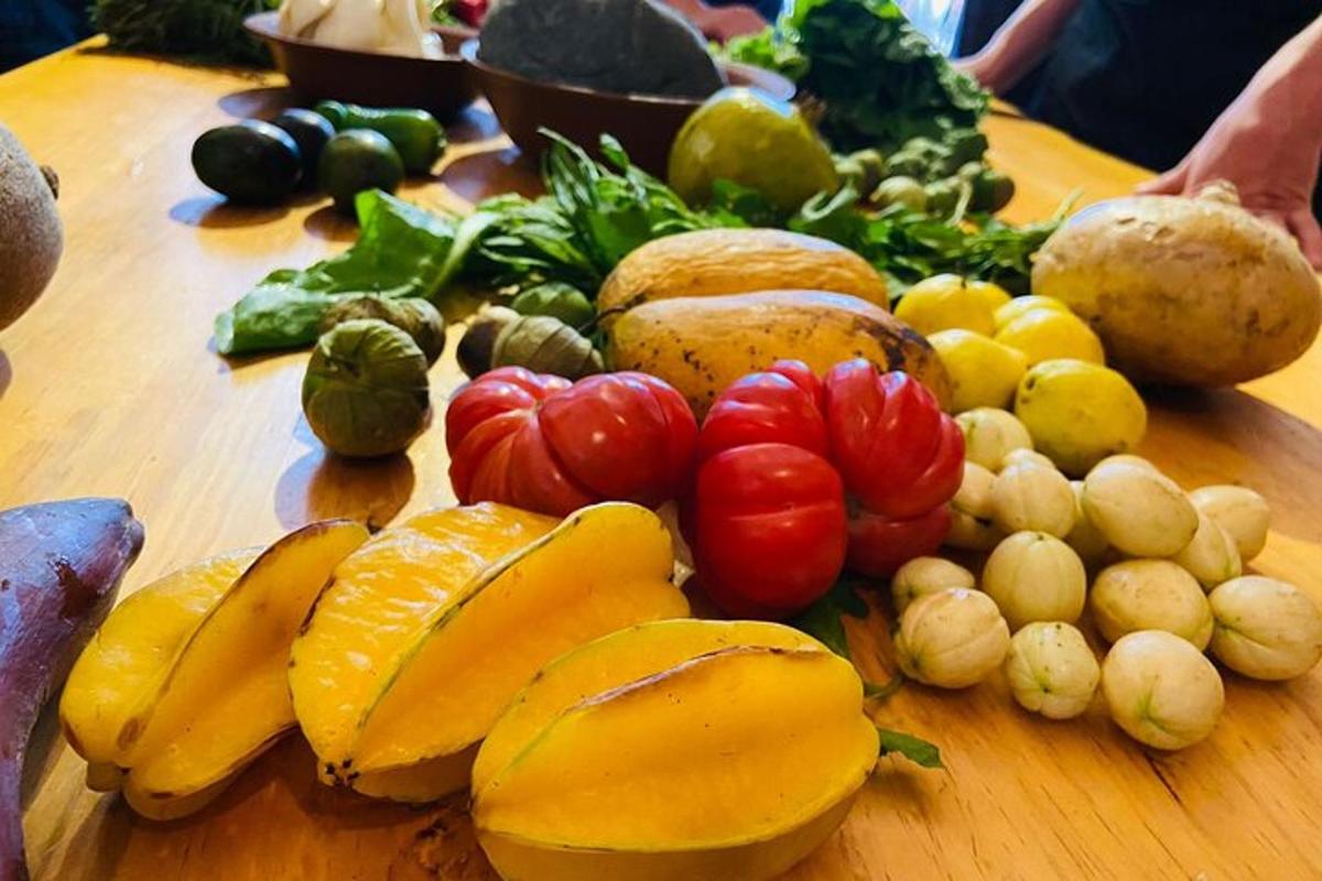 a bunch of fruits and vegetables on a wooden table
