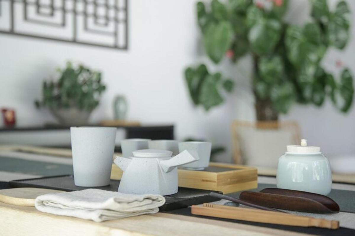 a table with dishes and napkins on a table