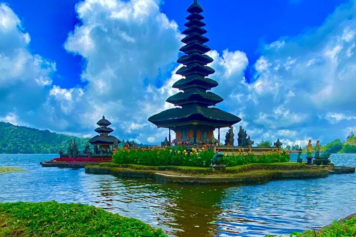 a small island in the middle of a lake with two towers