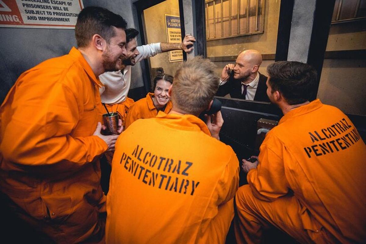 a group of men in orange suits in a room
