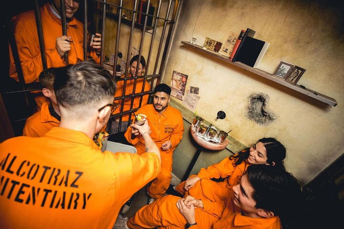 a group of people in orange uniforms in a room