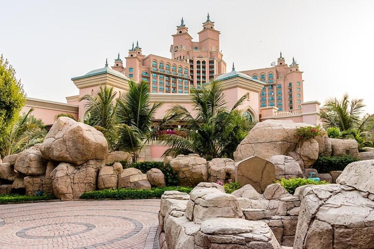 a large building in front of a resort