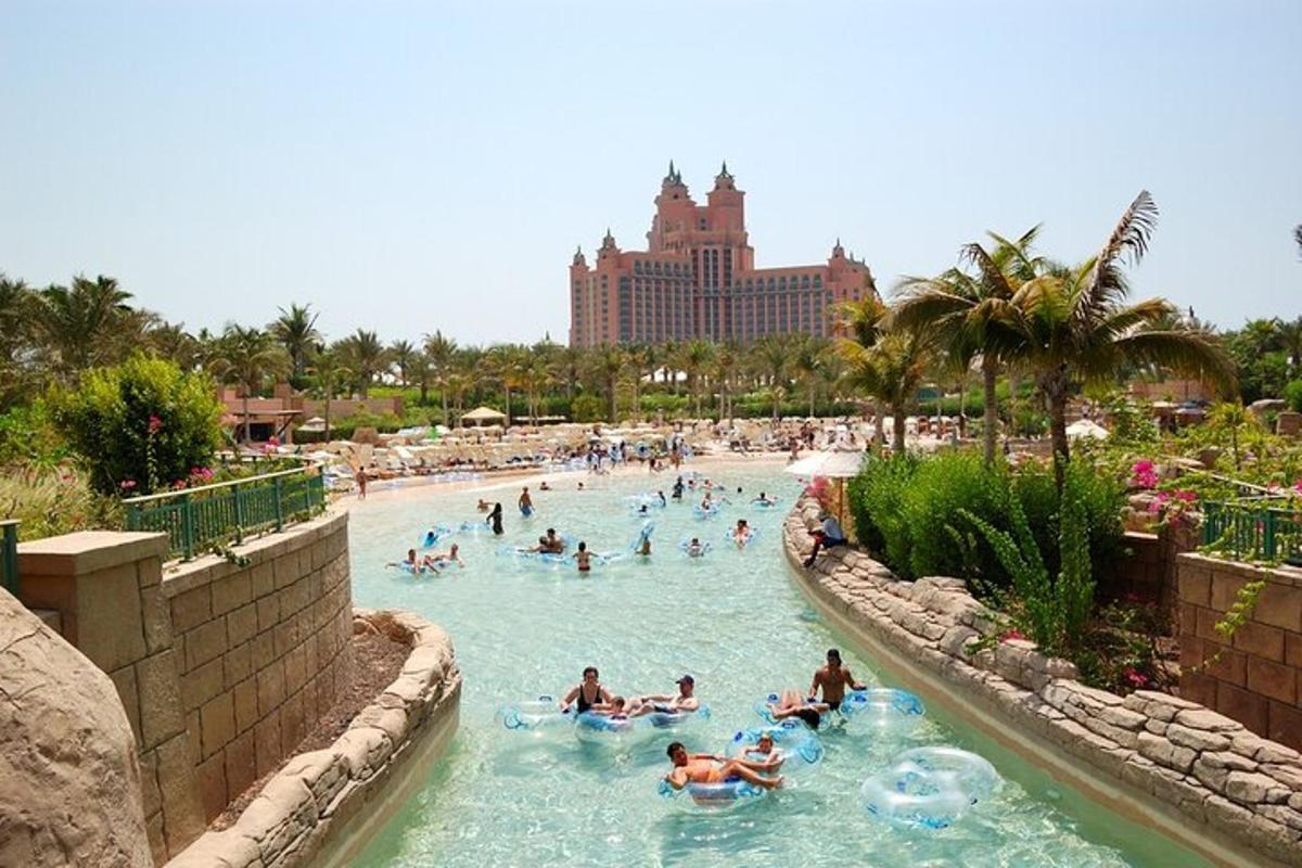 a group of people in a pool at a theme park