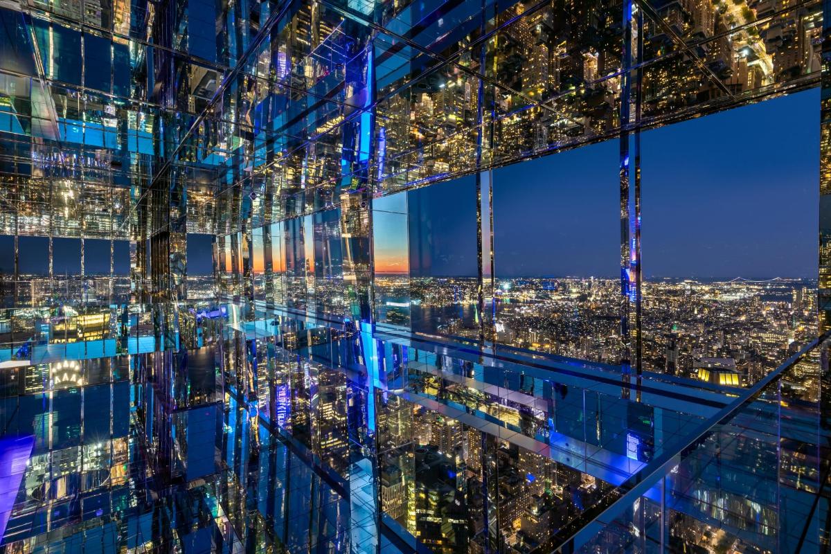 a view of a city from a skyscraper at night