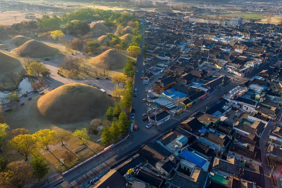 an aerial view of a city with a road