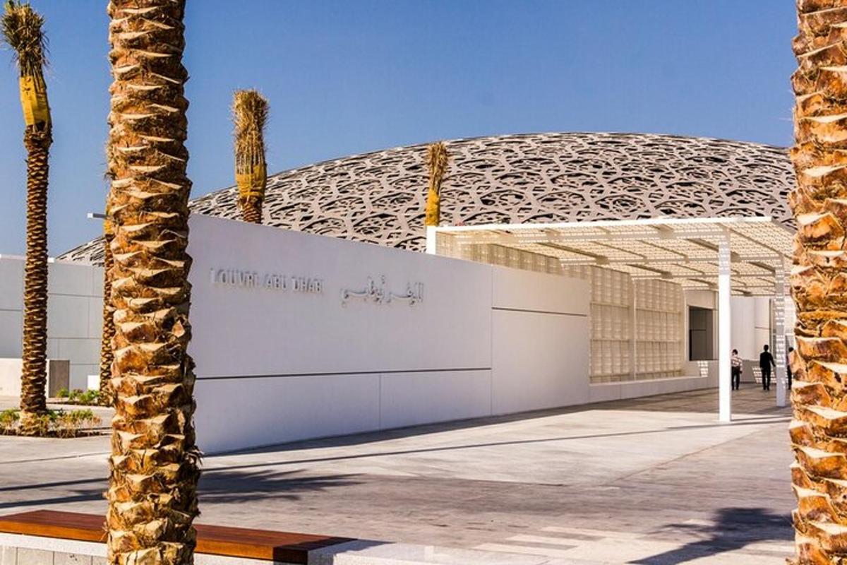 a building with a palm tree in front of it
