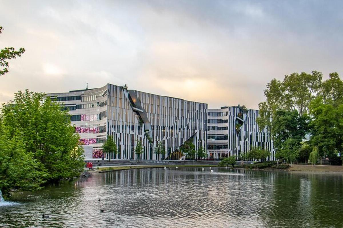 a building next to a river with a building