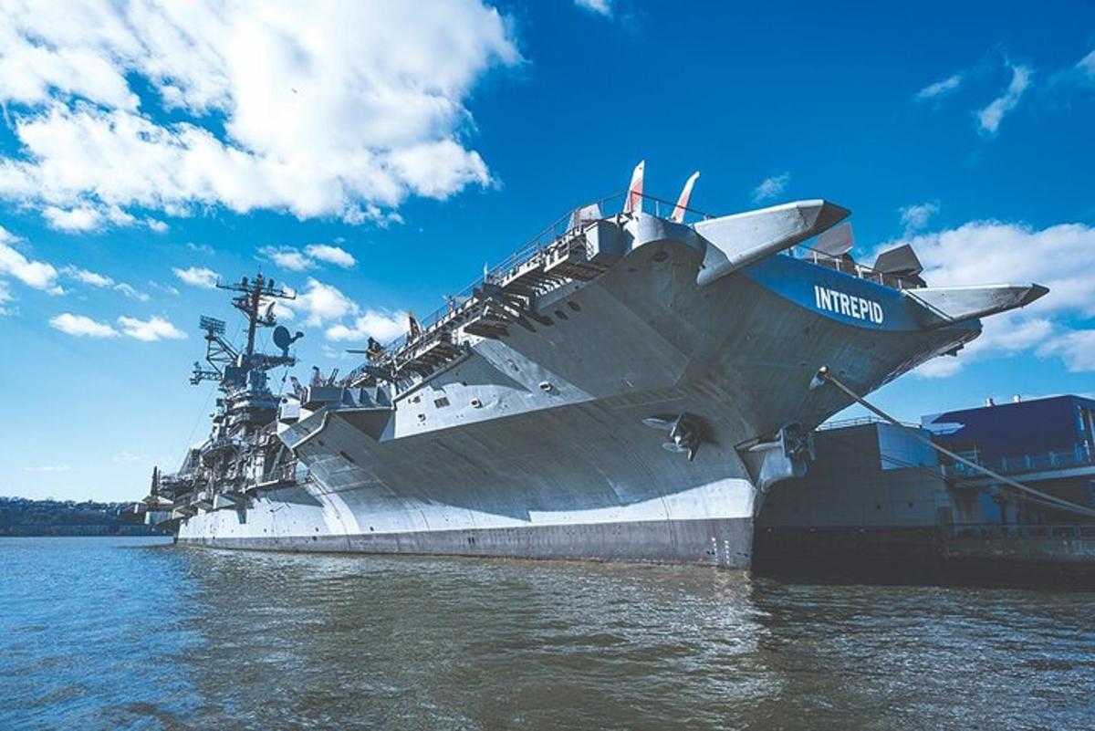 a large ship is docked in the water