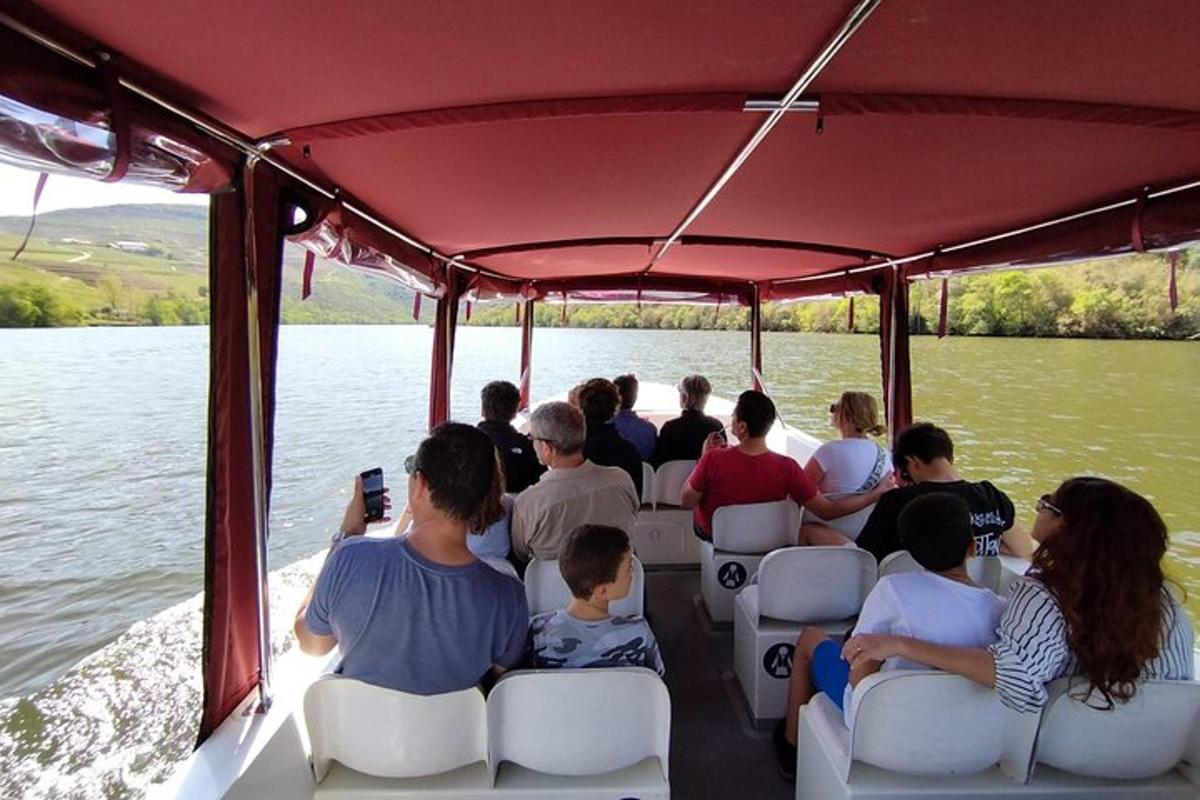 a group of people riding on a boat on the water