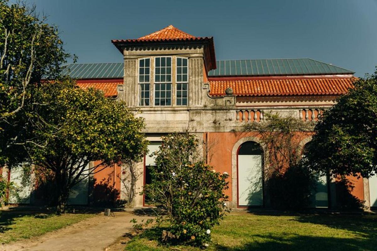 a large orange building with a large window