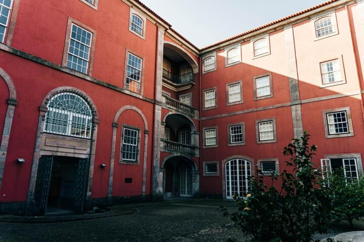 a large red building with a lot of windows