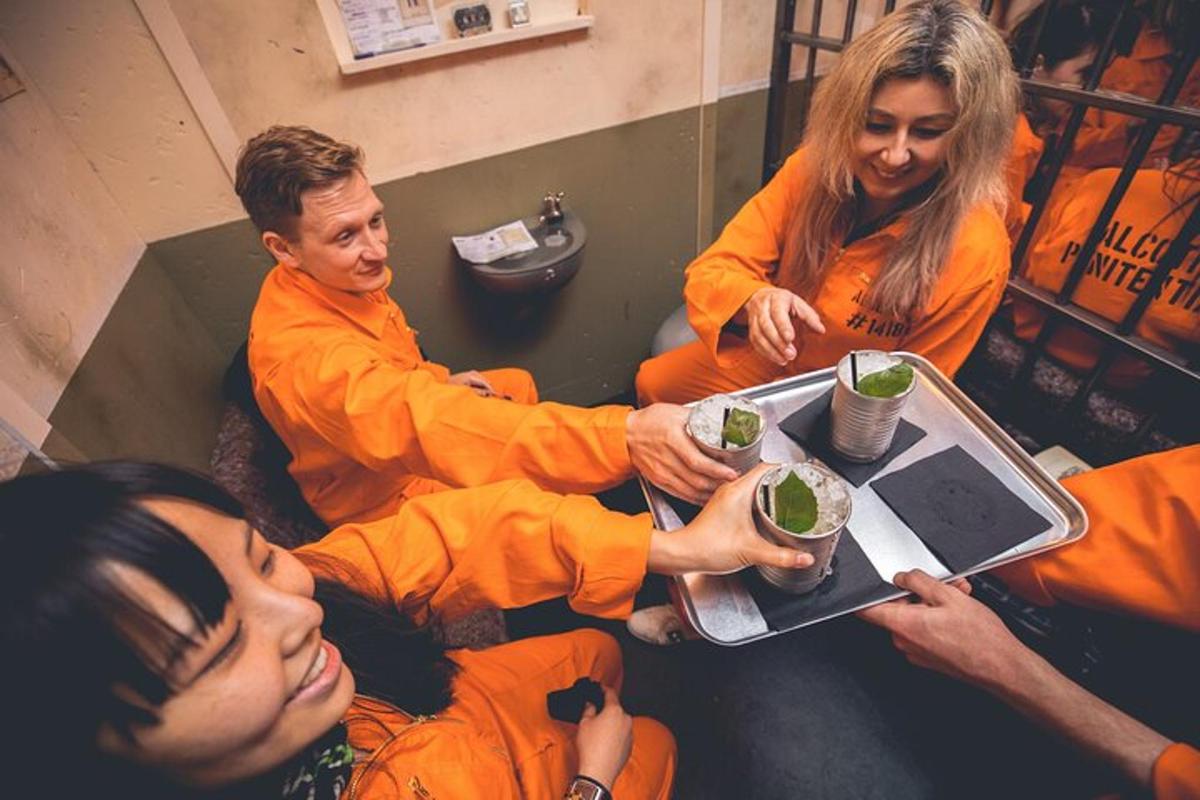 a group of people sitting around a table with food