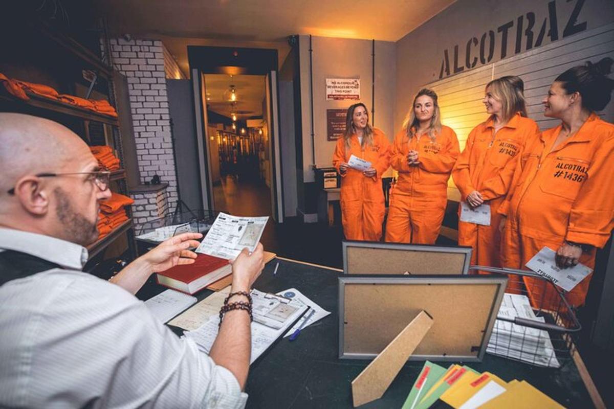 a group of people in orange suits in a room