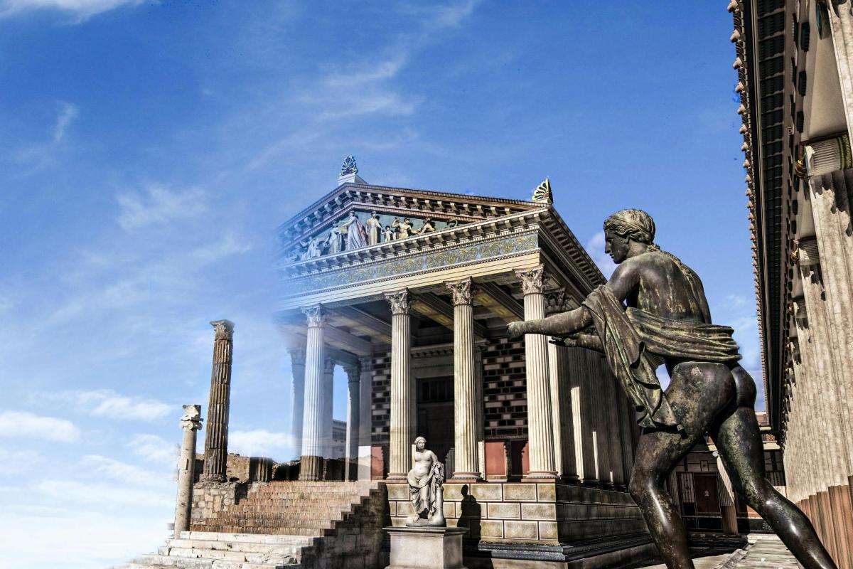 statua mężczyzny przed budynkiem