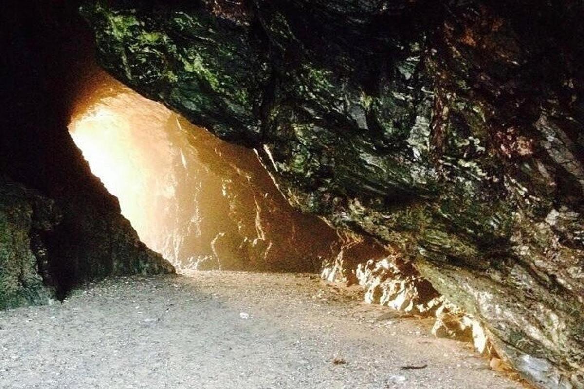a cave filled with water and a rock