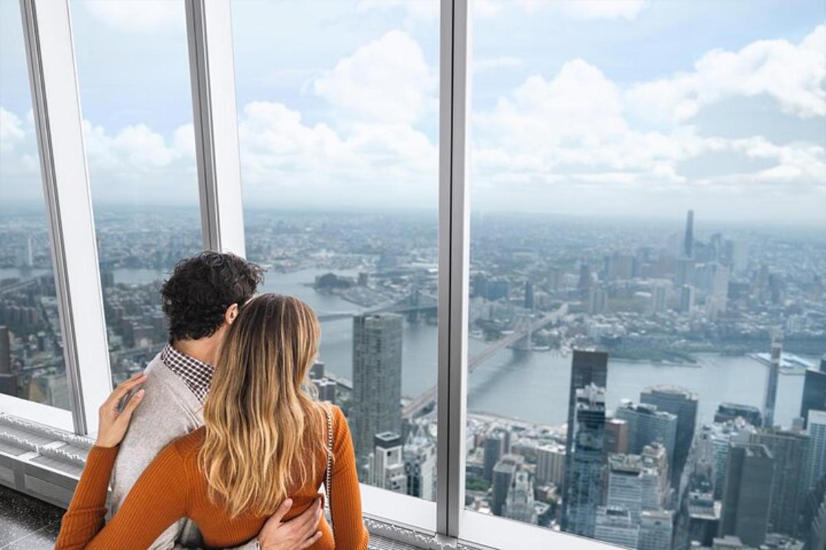 a man and a woman standing in front of a window