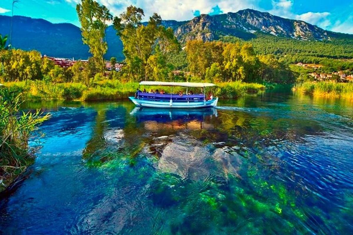 a boat on a river with people on it