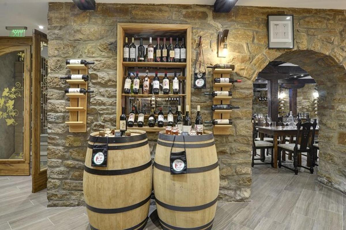 a wine tasting room with two barrels of wine
