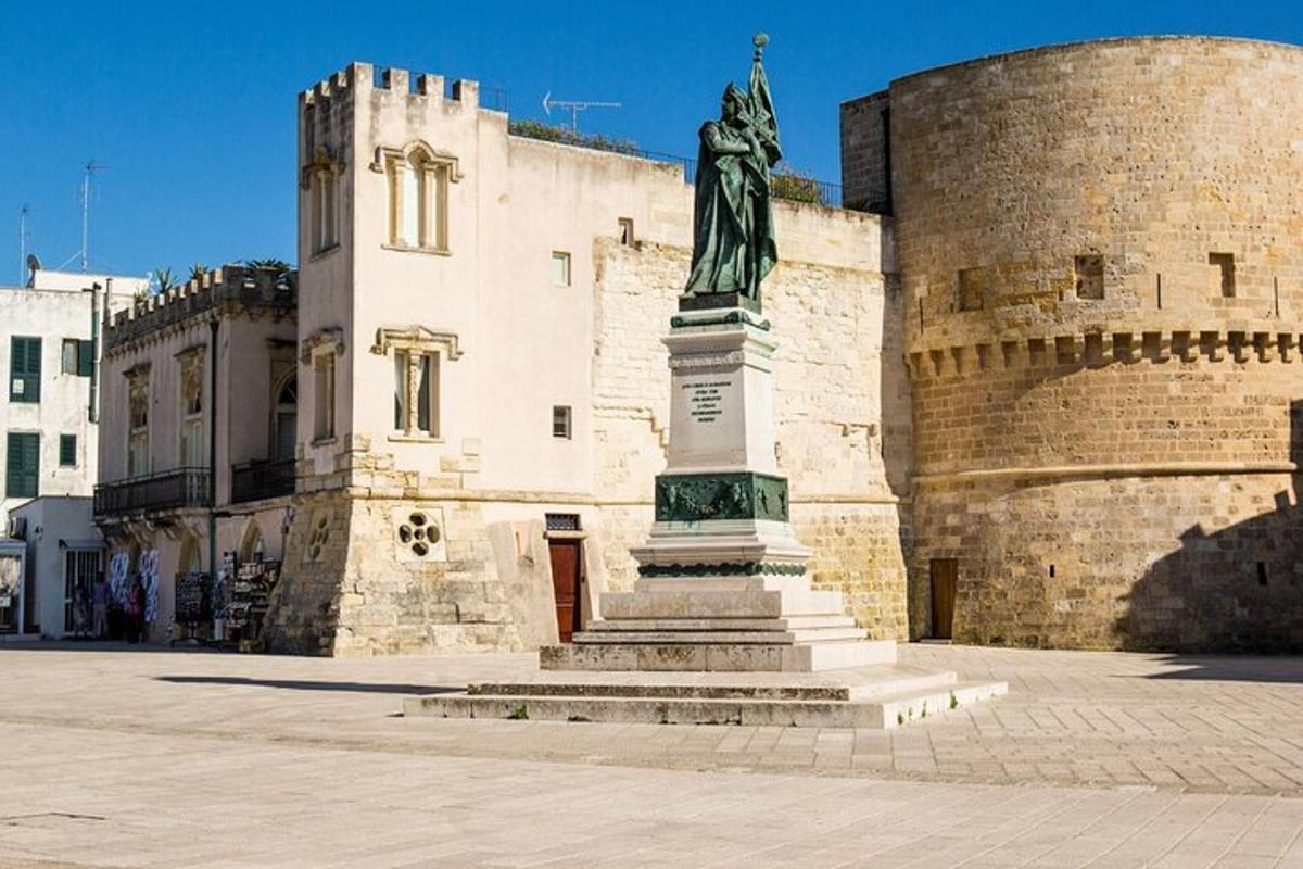 a statue of a woman in front of a building