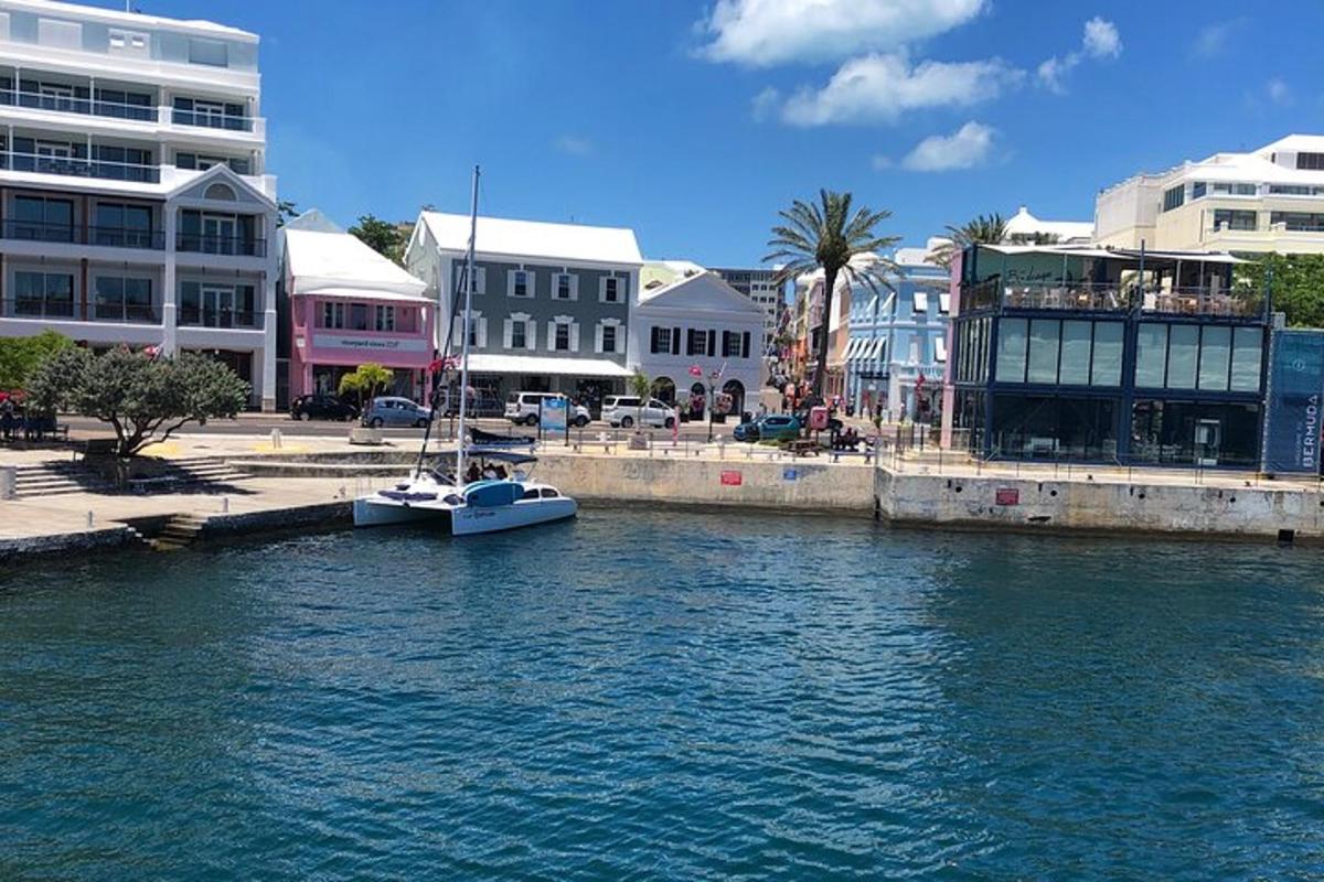 a boat is docked in the water next to buildings