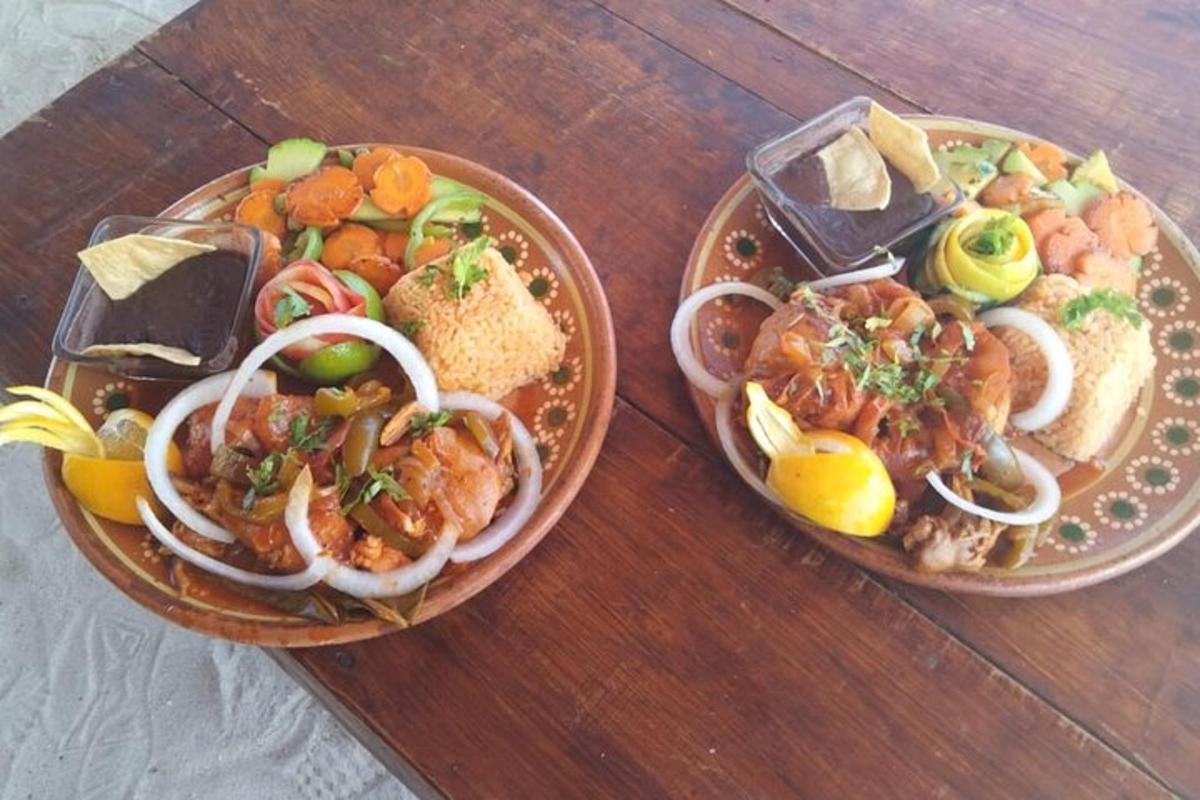 two plates of food on a wooden table
