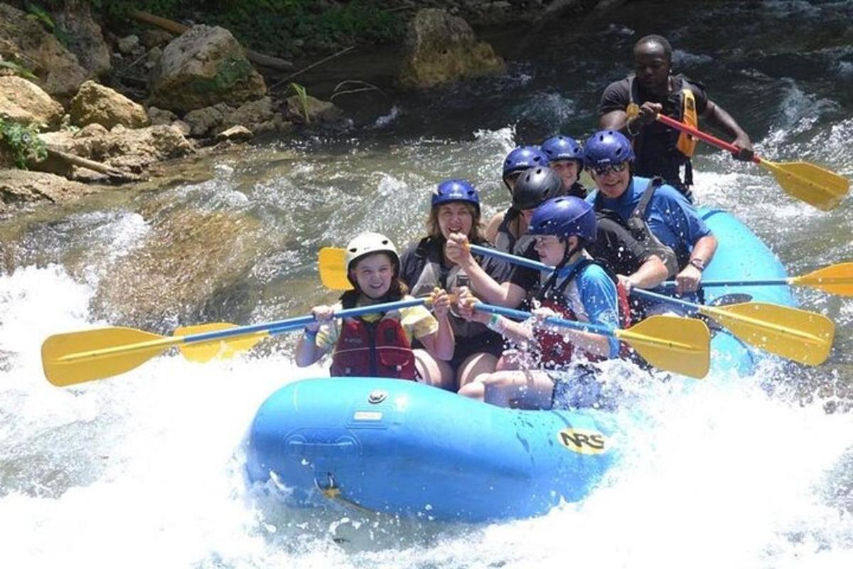 a group of people rafting on a river