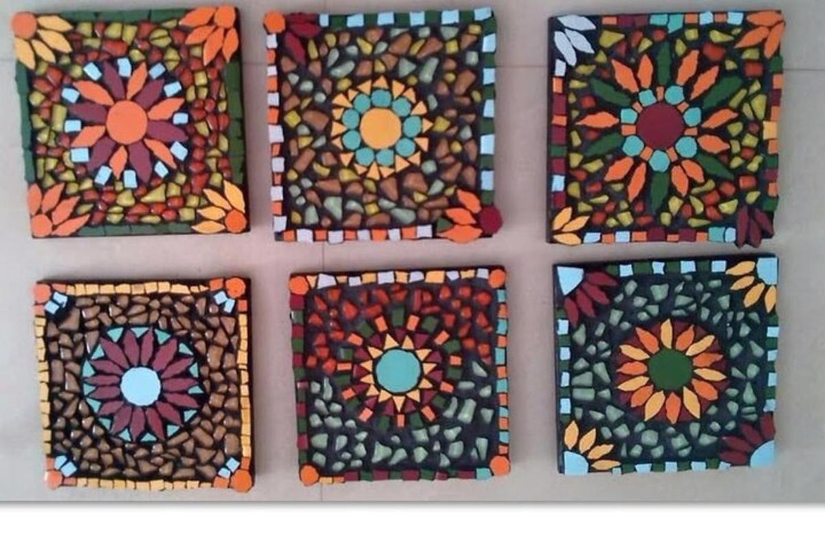 a group of stained glass windows on a wall