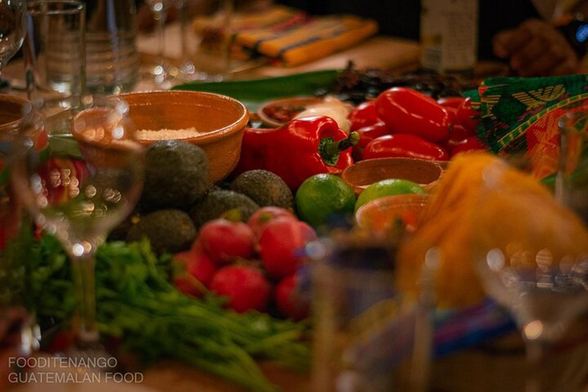 a table topped with lots of fresh fruits and vegetables