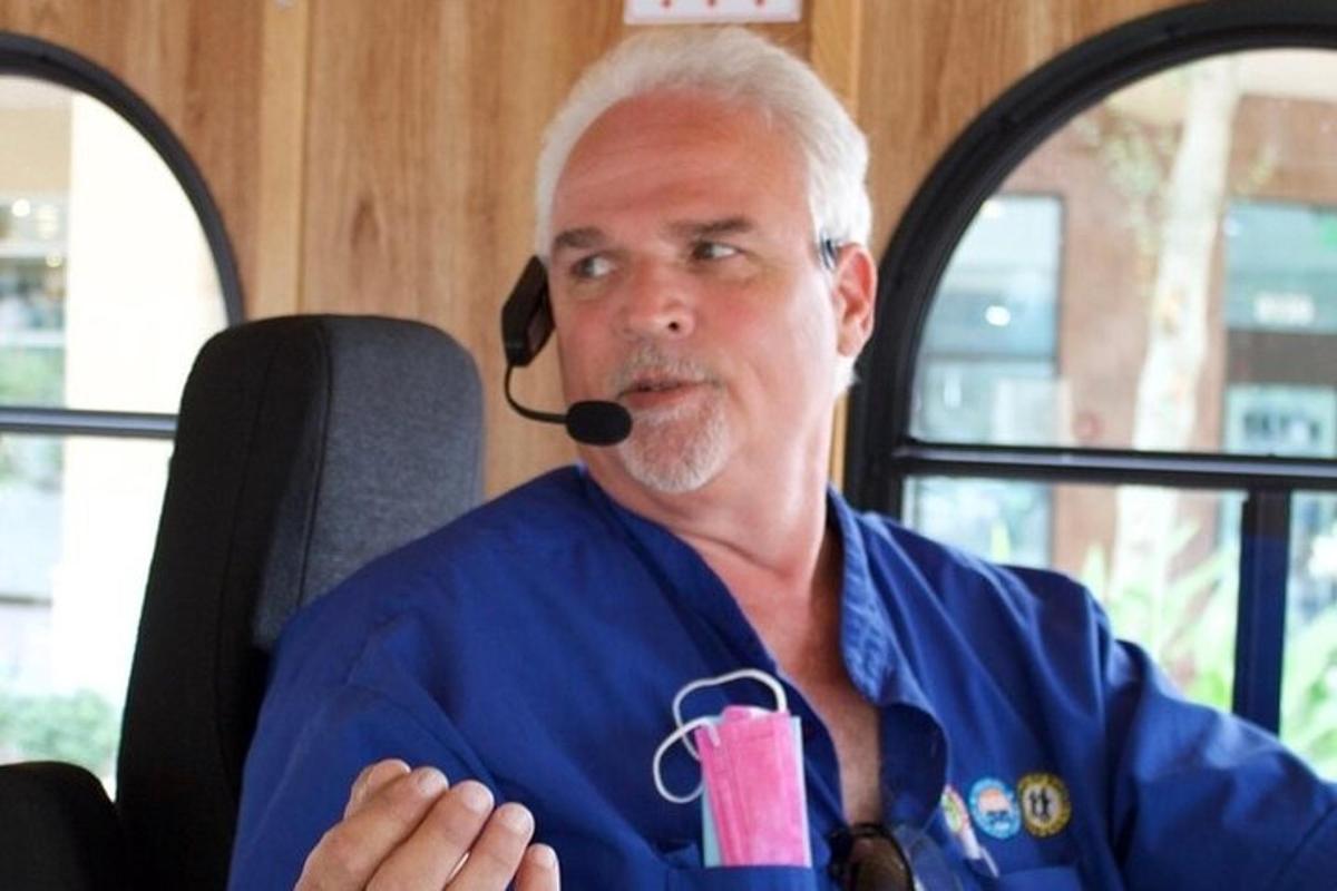 an older man with a pipe in his mouth