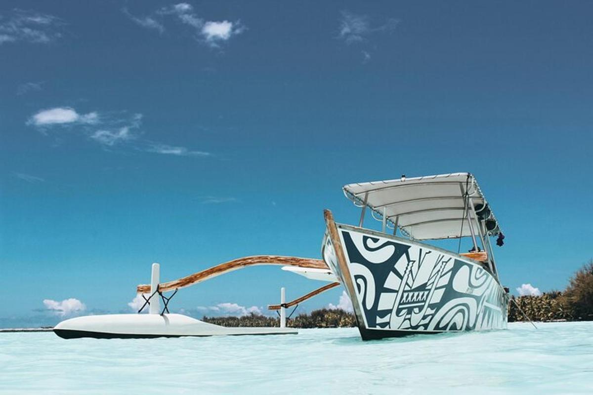 a boat sitting on top of a snow covered beach