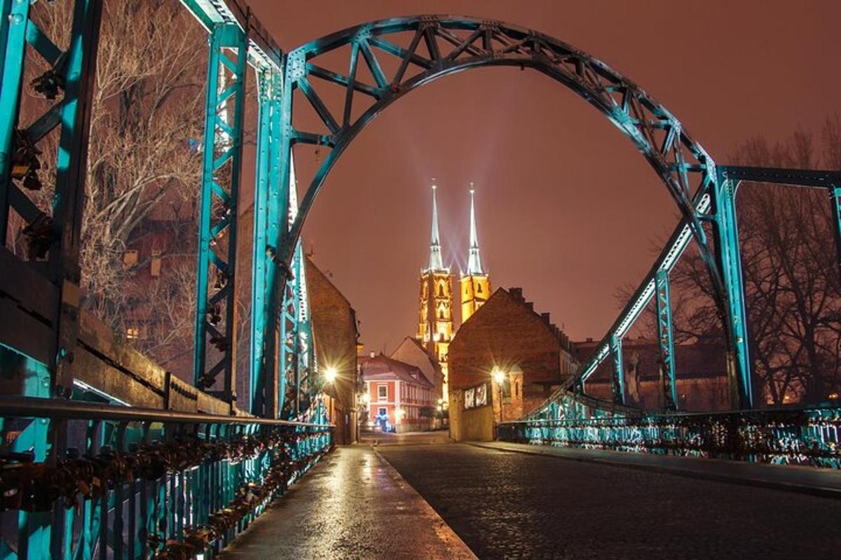 a bridge over a street with a clock tower